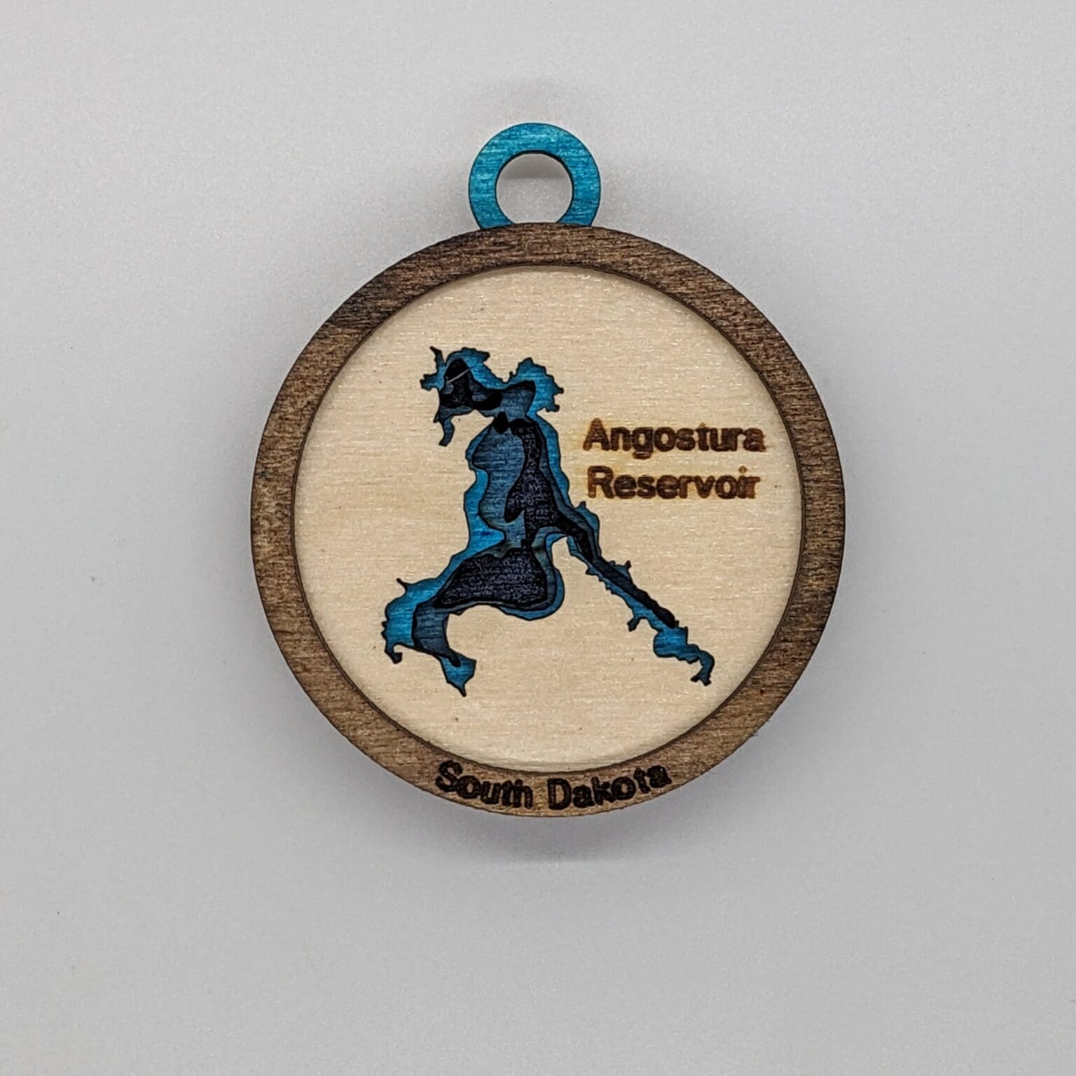 Custom wood ornament with a Angostura Reservoir lake map design