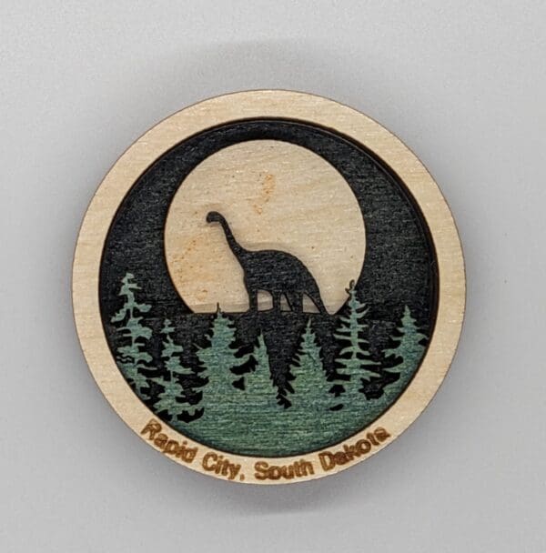 Custom wood magnet depicting Dinosaur Hill in Rapid City, SD