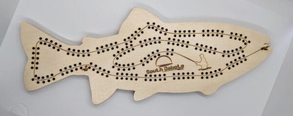 Custom trout shaped cribbage board with Soth Dakota text