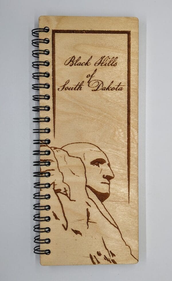 Custom wood journal cover depicting George Washington's face on Mt. Rushmore national monument with Black Hills of South Dakota text