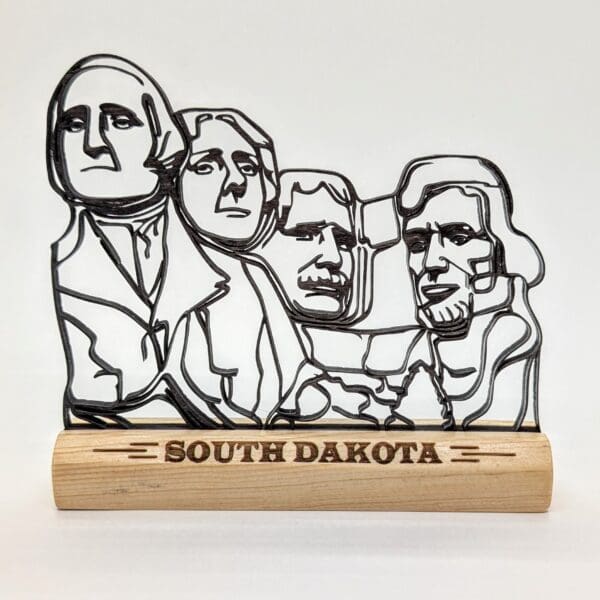 Custom wood continuous line sculpture of Mt. Rushmore