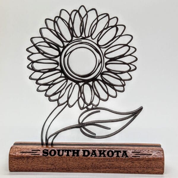 Custom wood continuous line sculpture of a sunflower