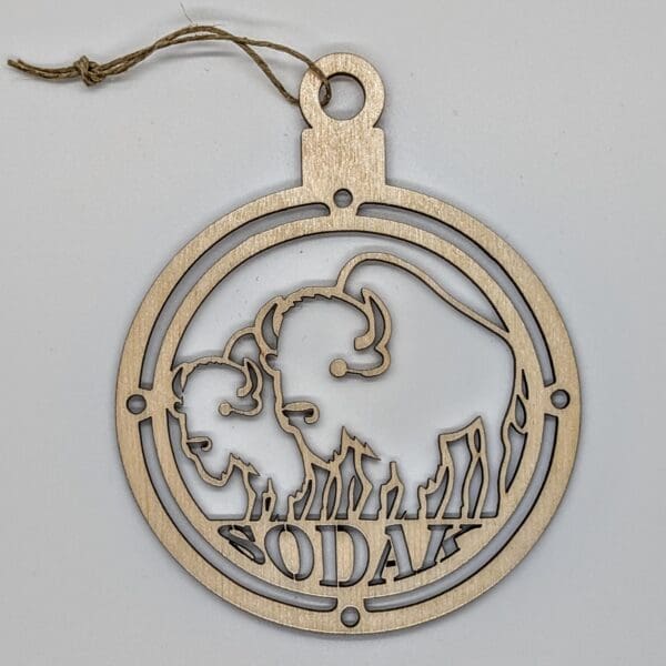 Custom wood ornament with bison and SoDak text