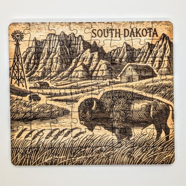 custom wooden puzzle showing buffalo and a South Dakota vista