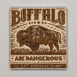 Wooden buffalo magnet with buffalo are dangerous do not approach, dummy text